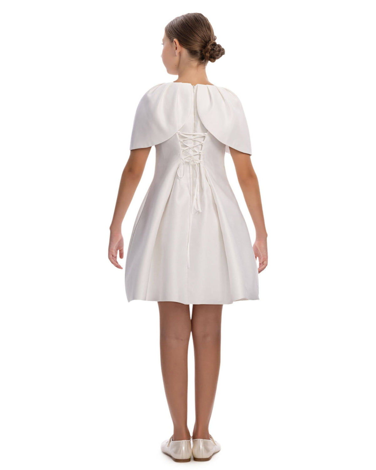White dress with cape on a white background